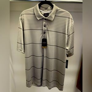 NWT Greg Norman Dry Fit Golf Polo. Size Large